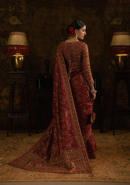 Aik Sari Edit ’25 Look 01 – Red bridal silk embroidered saree stitched with blouse & petticoat, luxury Pakistani designer outfit online.
