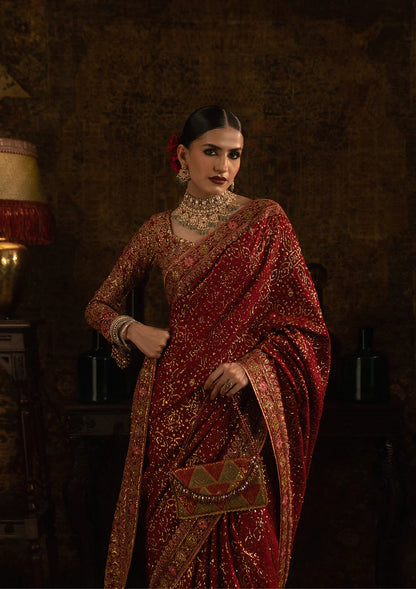 Aik Sari Edit ’25 Look 01 – Red bridal silk embroidered saree stitched with blouse & petticoat, luxury Pakistani designer outfit online.