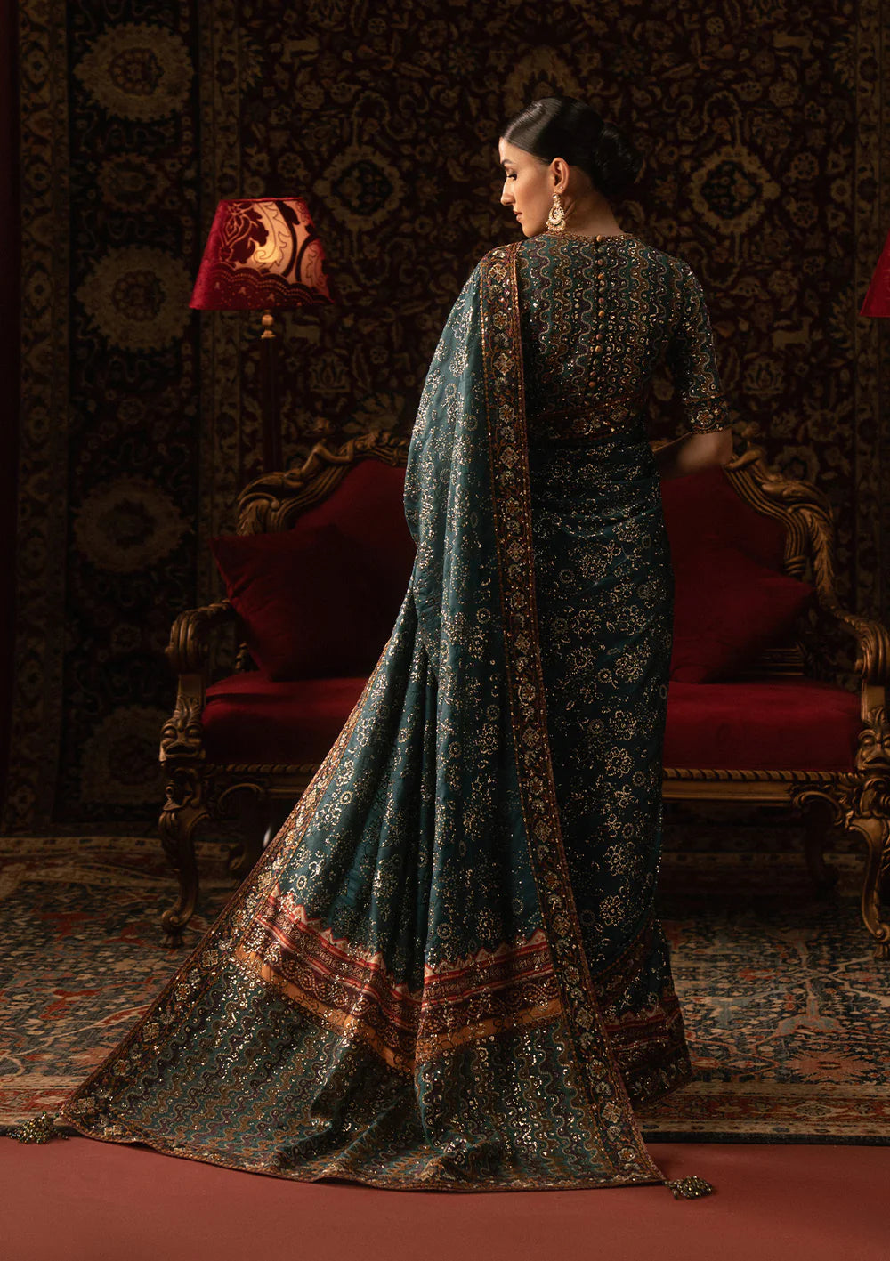 Aik Sari Edit ’25 Look 05 – Pakistani designer teal embroidered silk saree stitched with blouse & petticoat, luxury outfit at Pakistanimoda.