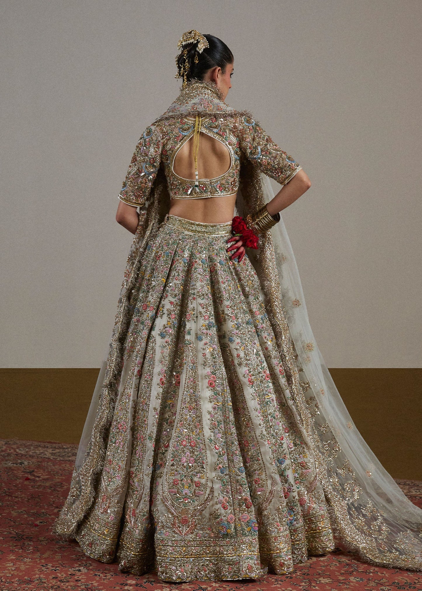 Sawara-Ivory Organza Lehenga with Paisley Motif & Embellished Blouse