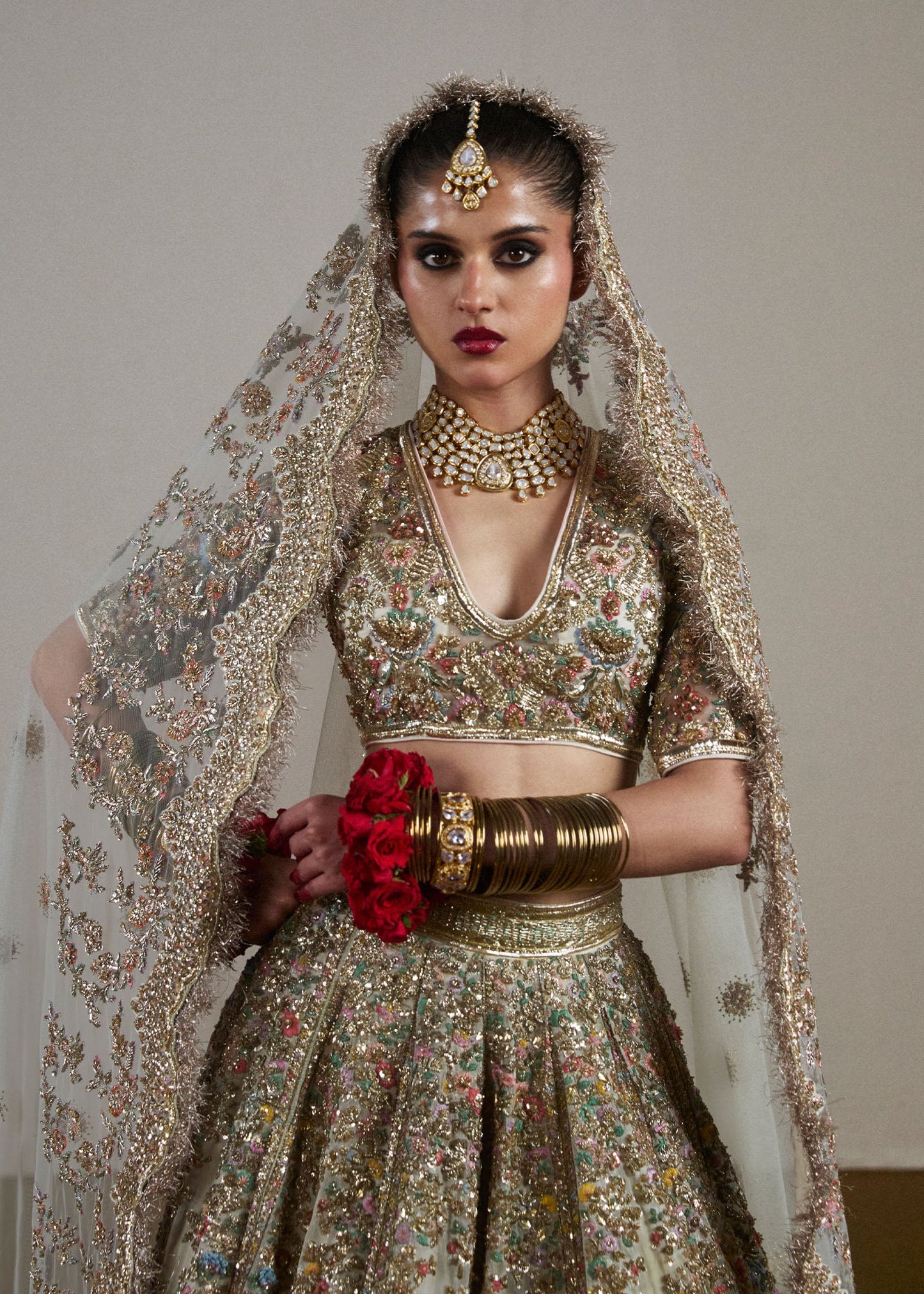 Sawara-Ivory Organza Lehenga with Paisley Motif & Embellished Blouse