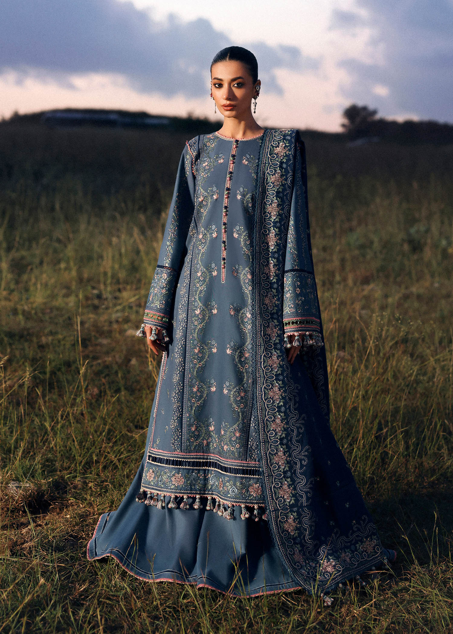 Hussain Rehar Saya light blue embroidered khaddar stitched suit with navy wool shawl at Pakistanimoda.