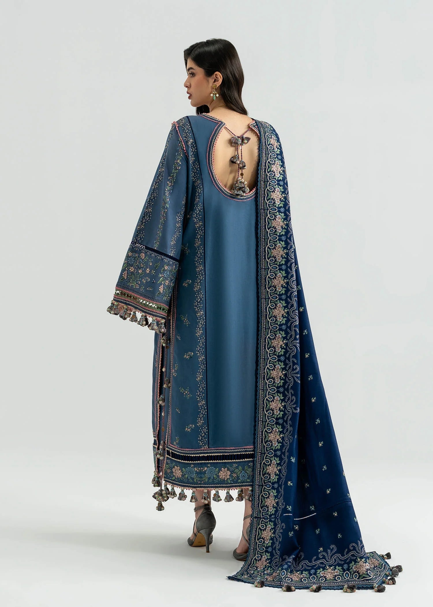 Hussain Rehar Saya light blue embroidered khaddar stitched suit with navy wool shawl at Pakistanimoda.