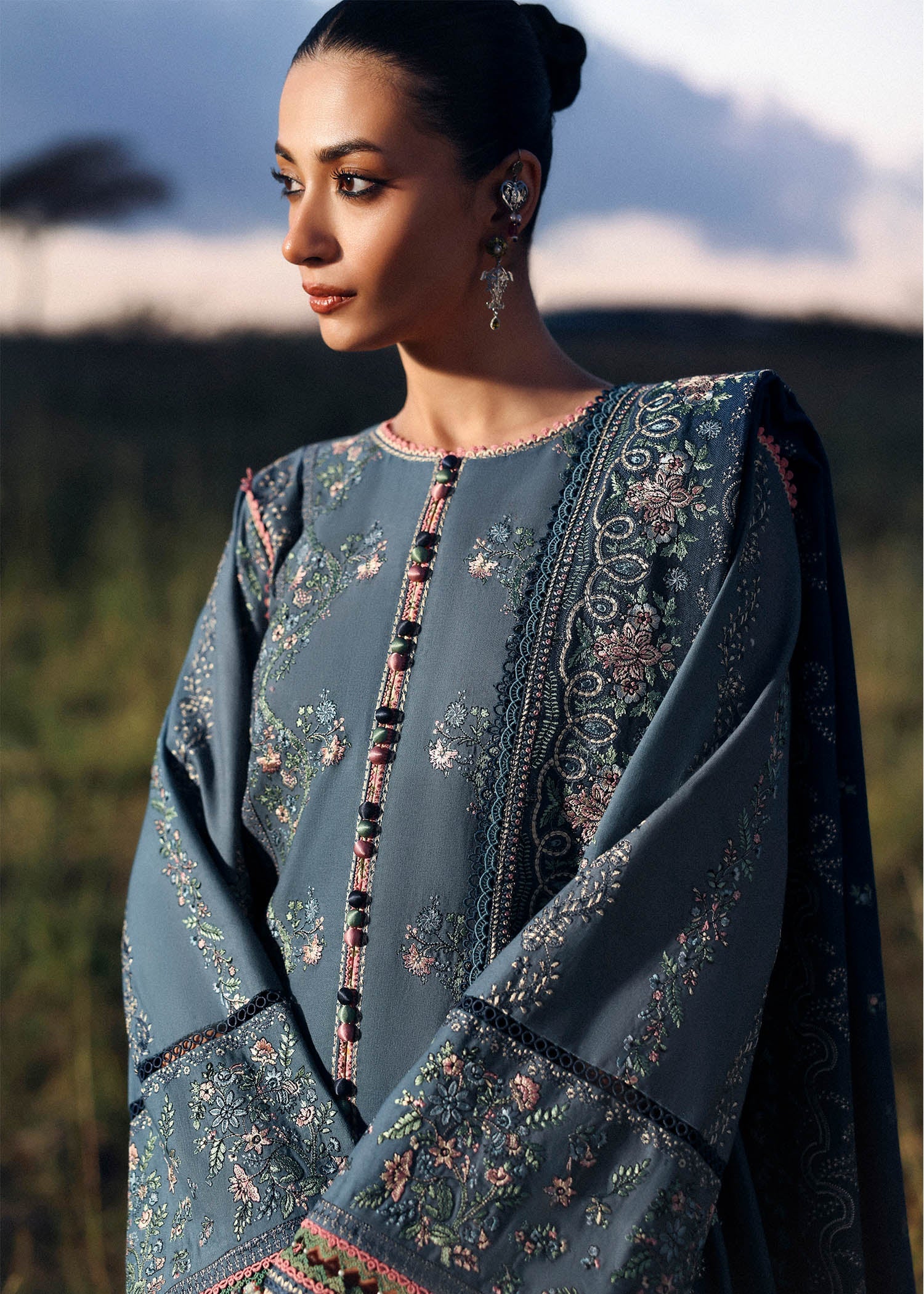 Hussain Rehar Saya light blue embroidered khaddar stitched suit with navy wool shawl at Pakistanimoda.