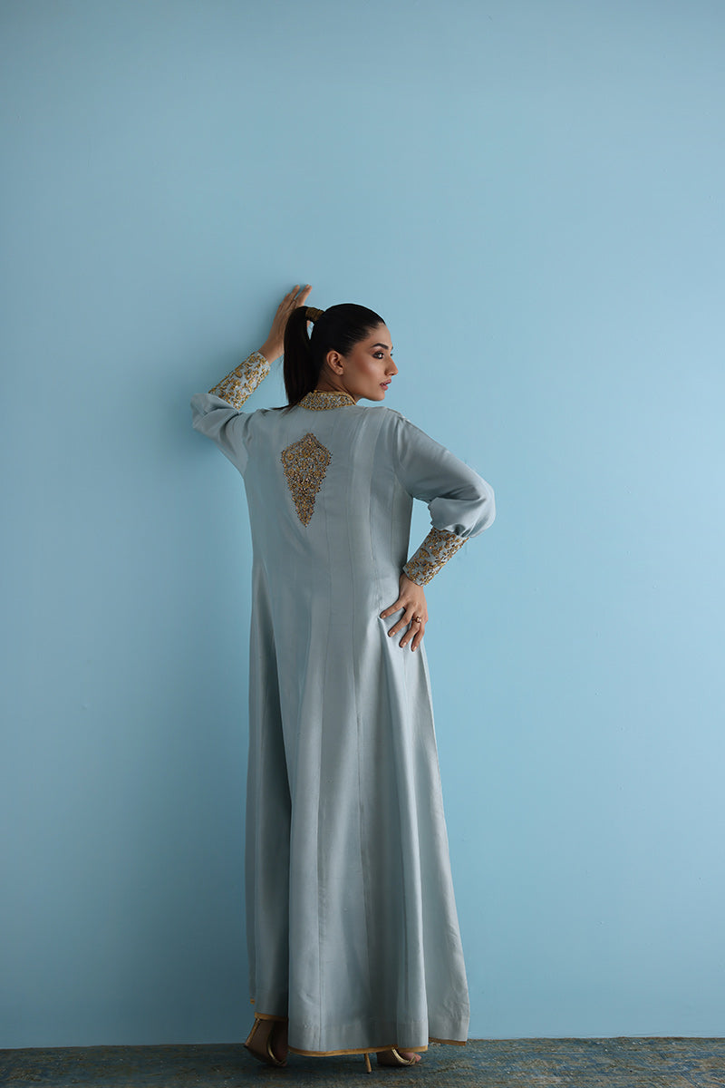 Sky blue high-neck raw silk dress with flared sleeves and pants set.