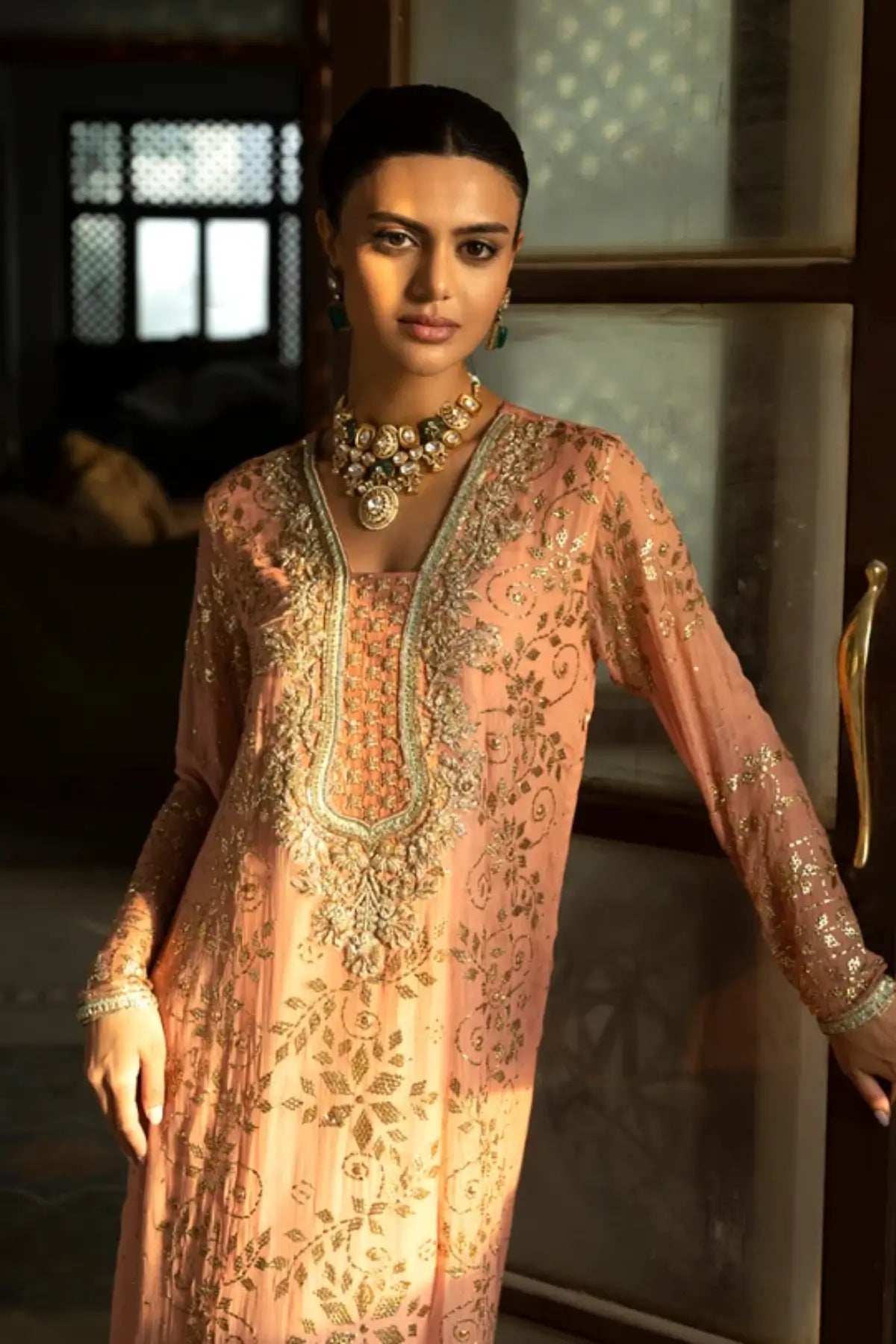 Seraphine peach Mukesh embroidered stitched formal kaftan with intricate Zardozi handwork and floral detailing