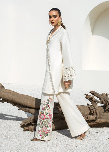 White raw silk crossover shirt with pants – elegant two-piece outfit.