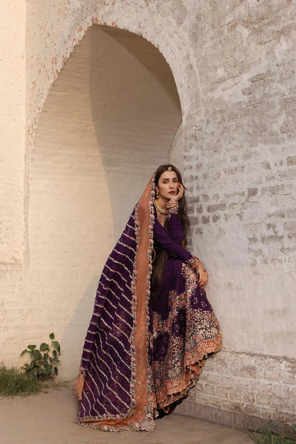 Shabnam Hussain Rehar plum embroidered raw silk stitched Peshwas and sharara with organza dupatta