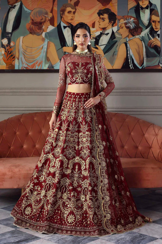 Shahbano regal maroon net bridal lehenga choli with embroidered dupatta by Akbar Aslam, luxury wedding couture for Pakistani brides.