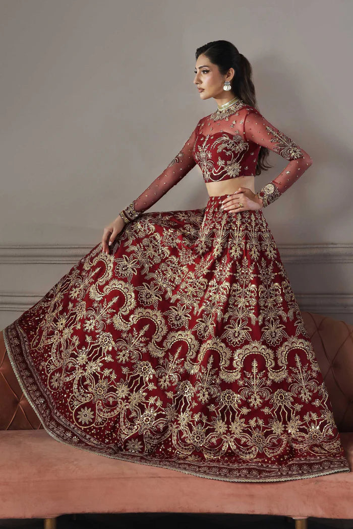 Shahbano regal maroon net bridal lehenga choli with embroidered dupatta by Akbar Aslam, luxury wedding couture for Pakistani brides.
