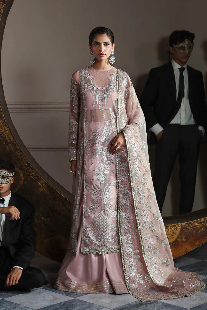 Shahmeena pastel pink organza embroidered dress with dupatta and silk trousers by Akbar Aslam, ideal for engagement parties and festive occasions.