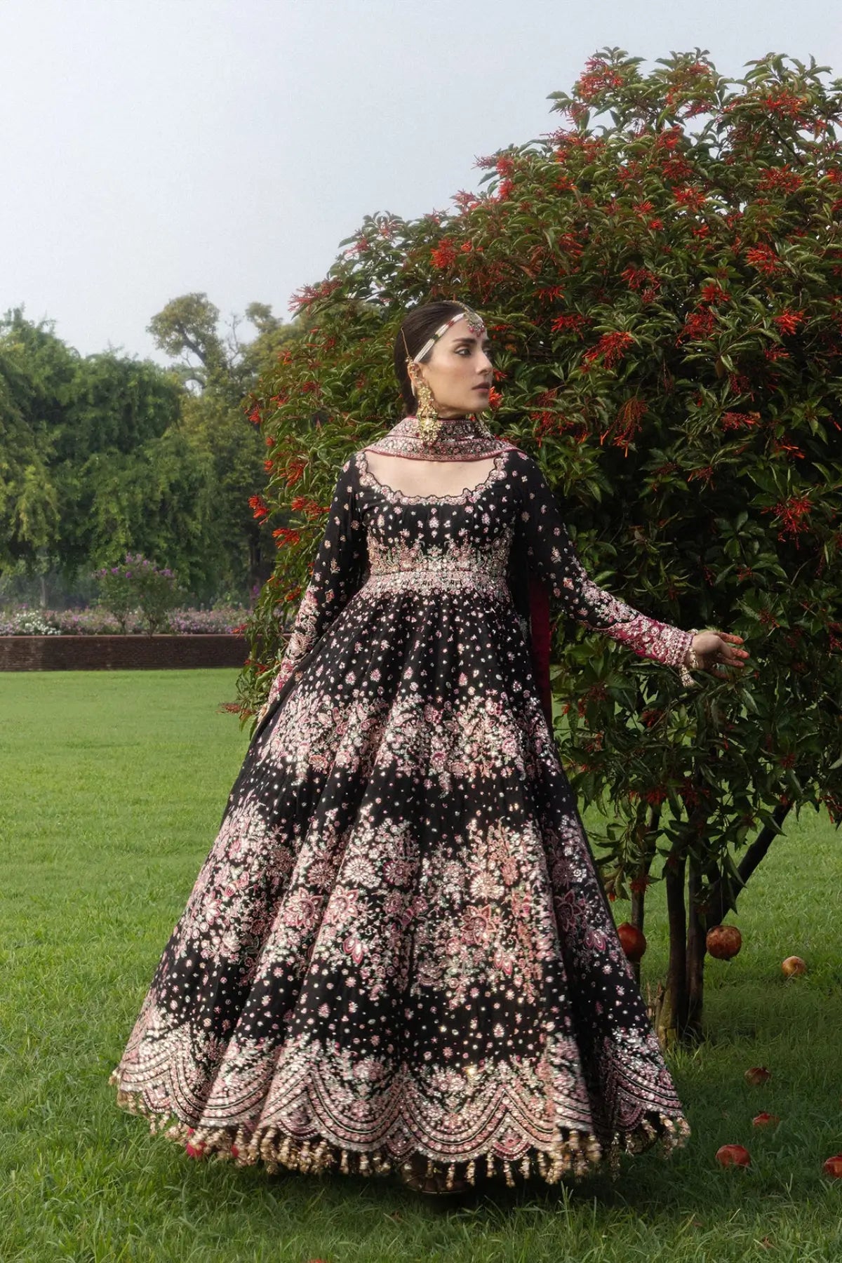 Shahnoor Hussain Rehar black raw silk stitched wedding Peshwas with fuchsia churidar and embroidered organza dupatta