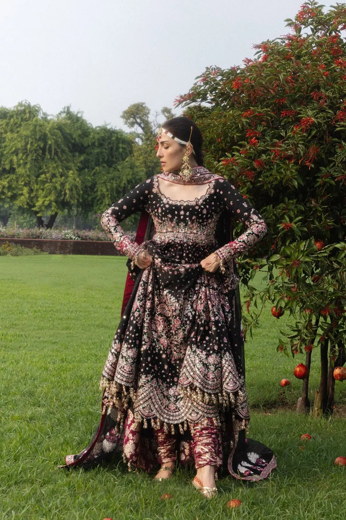 Shahnoor Hussain Rehar black raw silk stitched wedding Peshwas with fuchsia churidar and embroidered organza dupatta