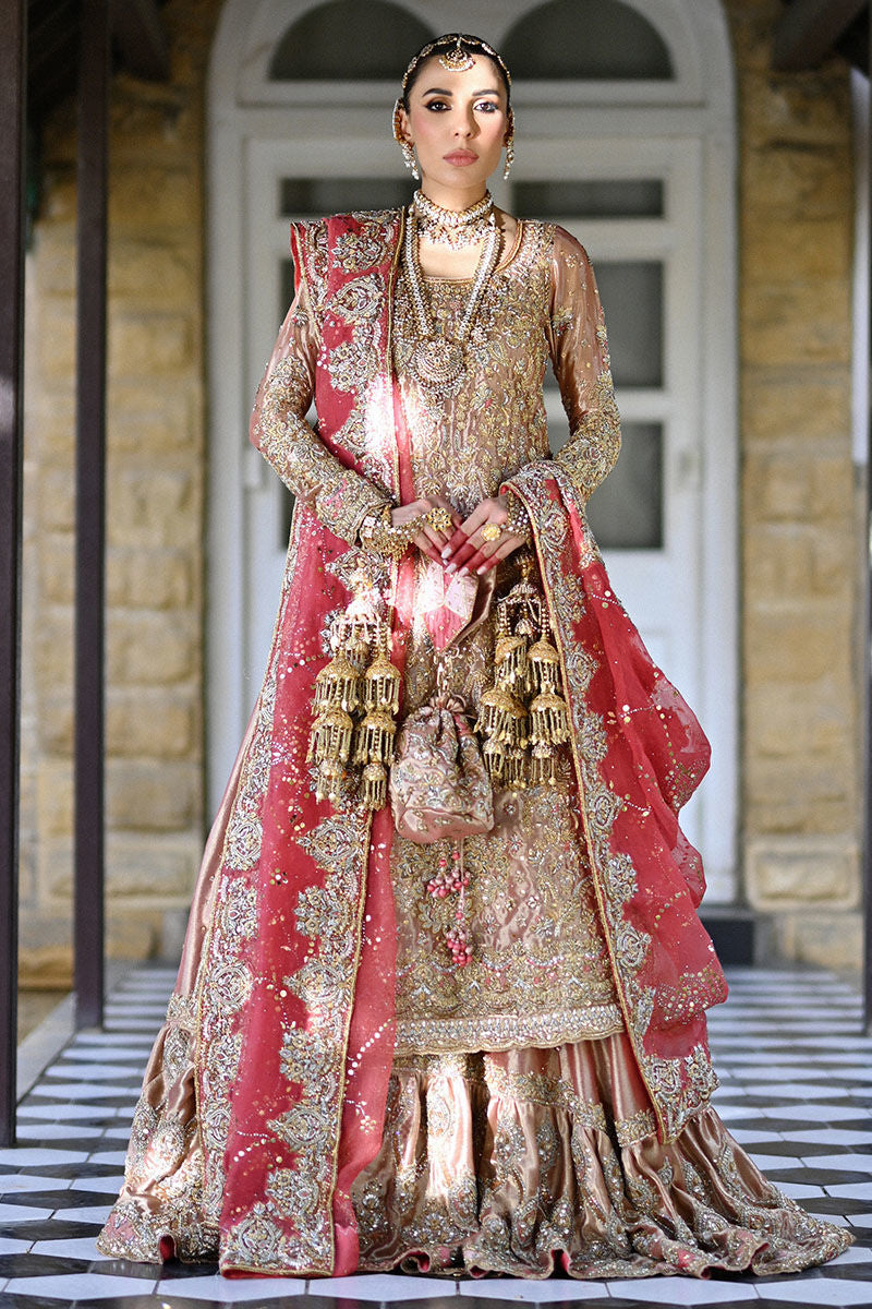 Watermelon pink Pakistani bridal farshi set with Swarovski and traditional handwork, paired with an organza net kamdani dupatta – ideal for brides in USA, UK, and Canada.