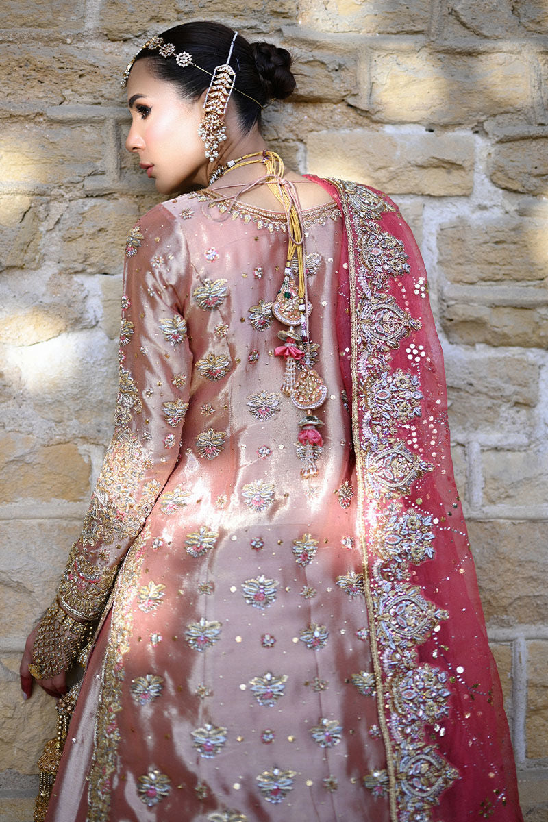 Watermelon pink Pakistani bridal farshi set with Swarovski and traditional handwork, paired with an organza net kamdani dupatta – ideal for brides in USA, UK, and Canada.