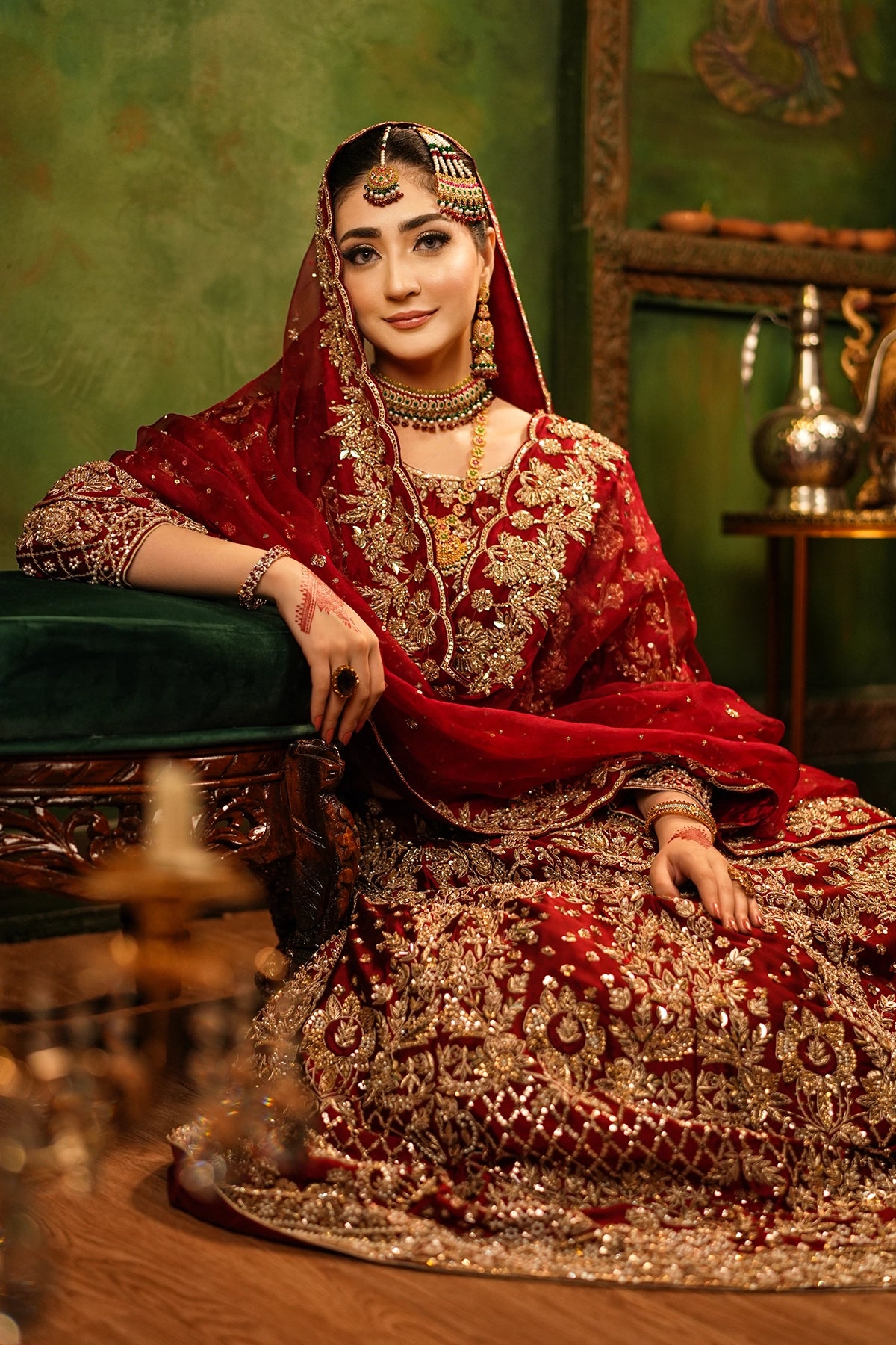 Shehrbano deep red Tassel Silk Pakistani bridal lehenga choli with gold handwork and organza dupatta by MariamRaj