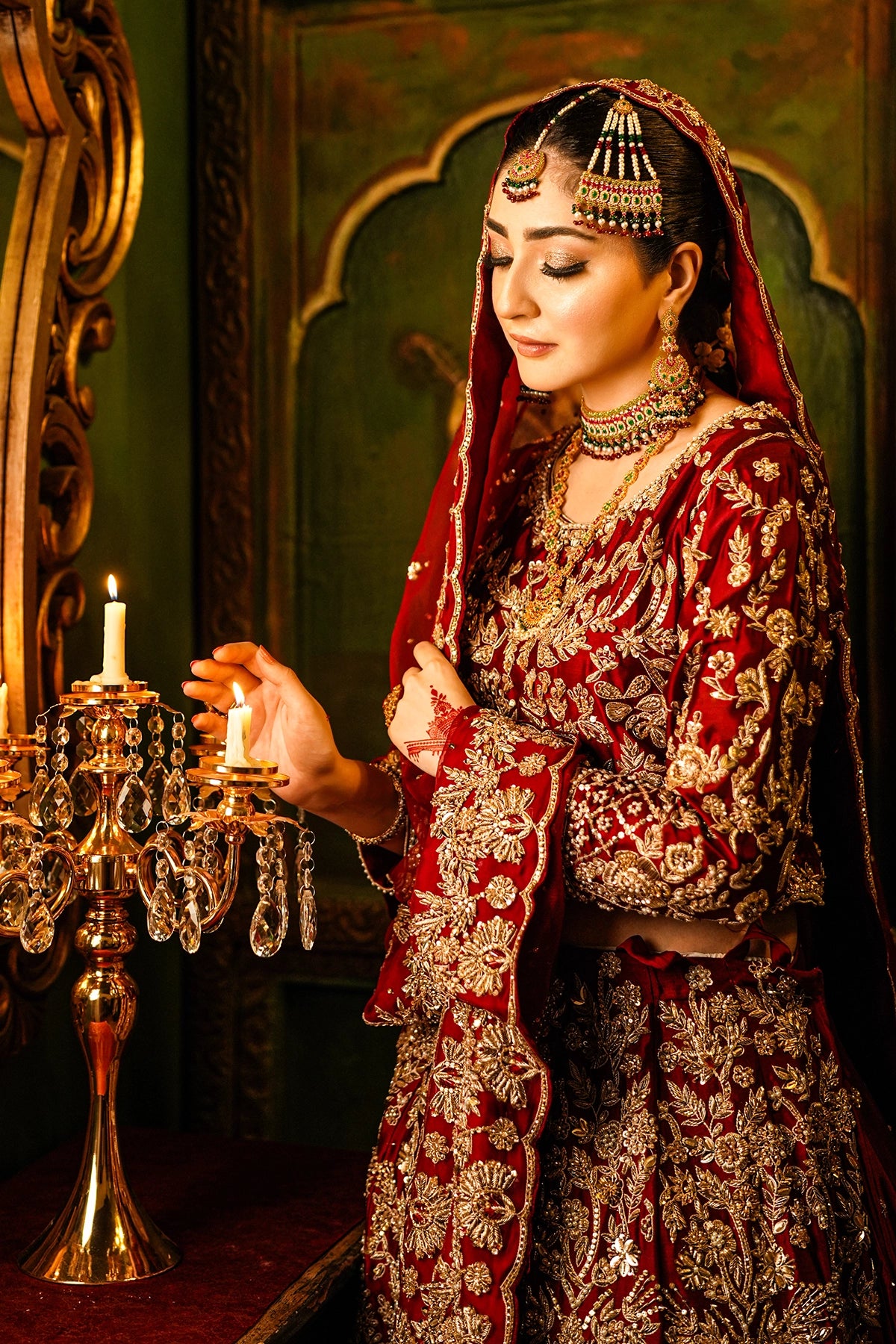 Shehrbano deep red Tassel Silk Pakistani bridal lehenga choli with gold handwork and organza dupatta by MariamRaj