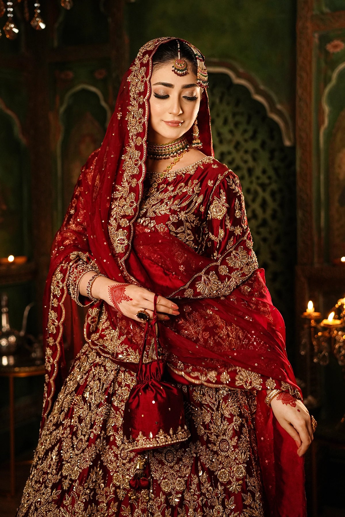 Shehrbano deep red Tassel Silk Pakistani bridal lehenga choli with gold handwork and organza dupatta by MariamRaj