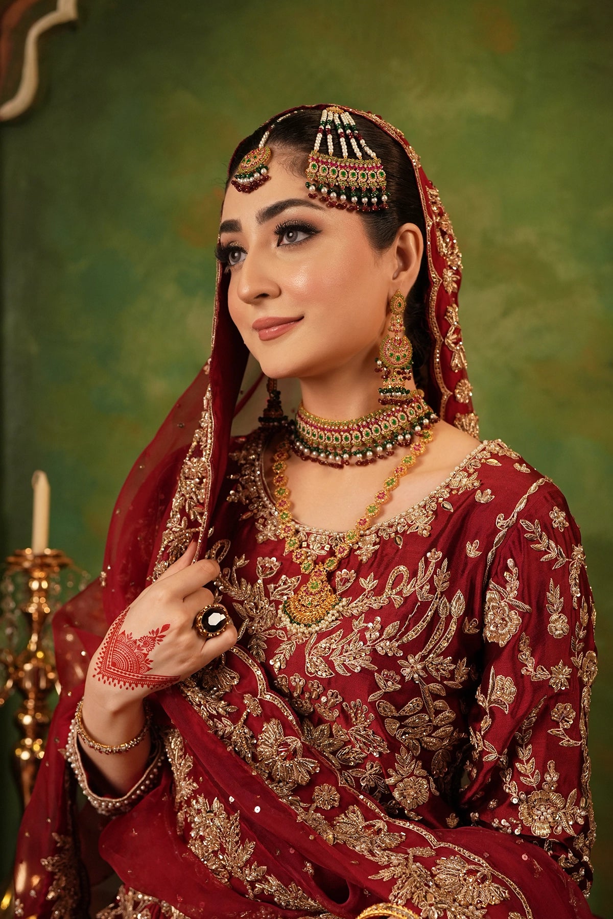 Shehrbano deep red Tassel Silk Pakistani bridal lehenga choli with gold handwork and organza dupatta by MariamRaj
