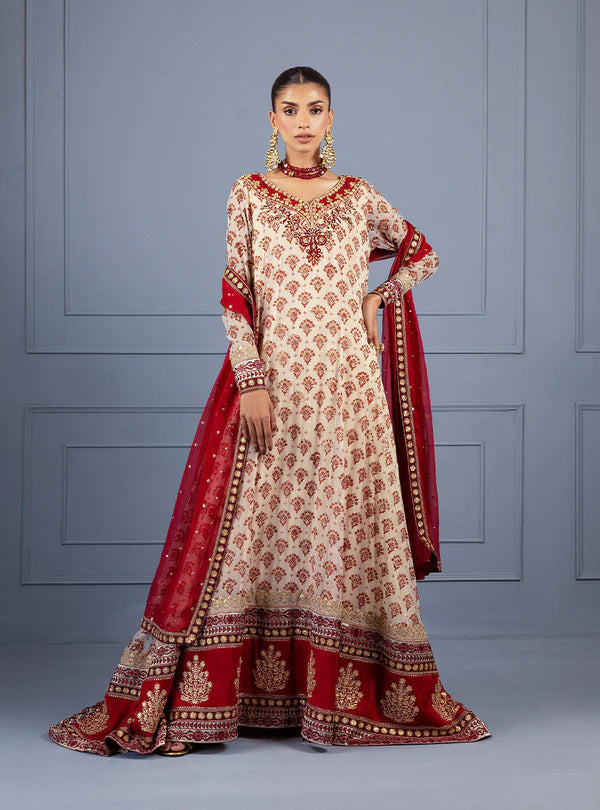 Gulzar by Zainab Chottani ivory frock with maroon block prints, hand embroidery, sequin chan, raw silk trousers, and maroon chiffon dupatta for weddings.