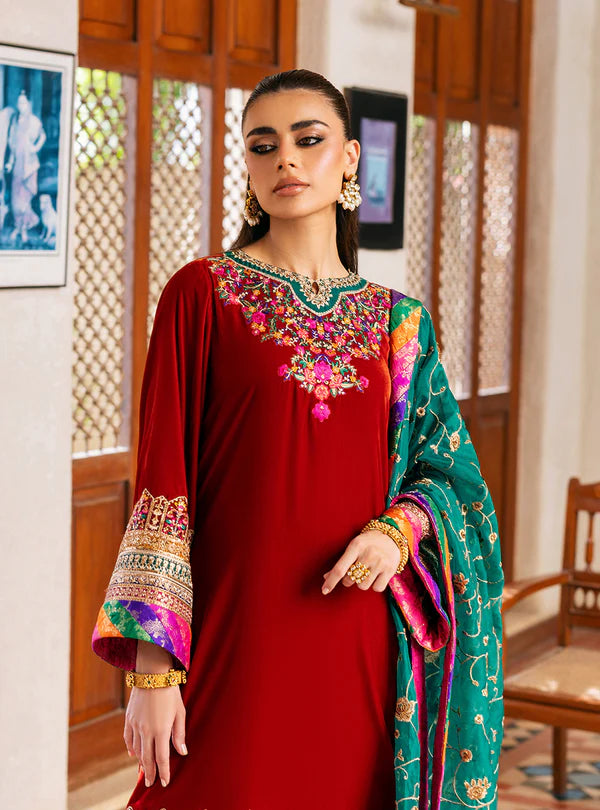 Sifa Rust Red Velvet Embroidered Suit by Zainab Chottani with Turquoise Organza Dupatta from the Velvet Stitched ’25 Collection at Pakistanimoda.com.