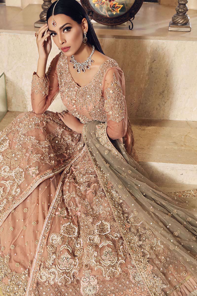 Singhar-Peach lehenga paired with tea pink Bridal Gown