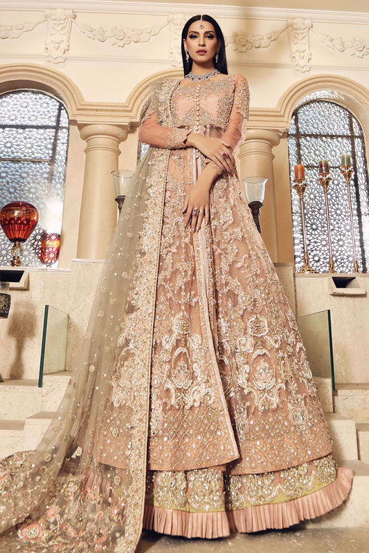 Singhar-Peach lehenga paired with tea pink Bridal Gown