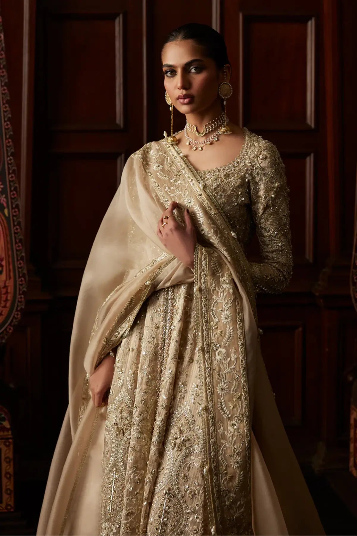 Sira champagne tissue Pishwas sharara set by Saad Bin Shahzad with Chanderi tissue, raw silk sharara and organza dupatta