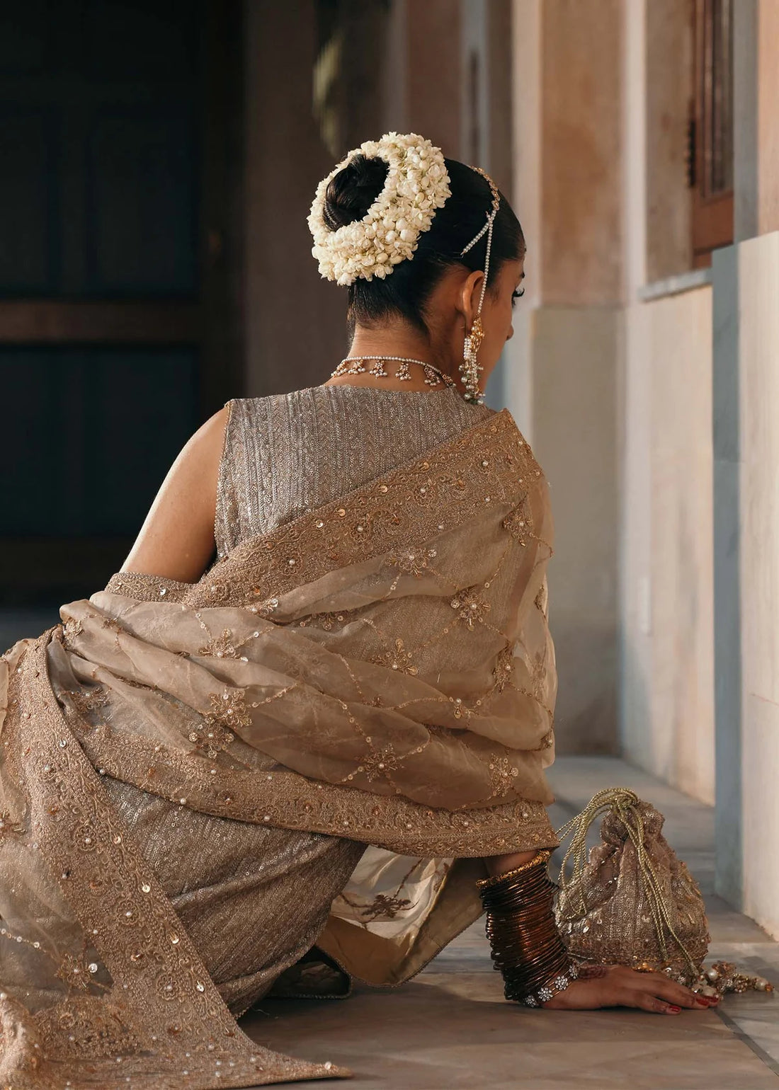 Sitara greyish brown embellished outfit with churidar pajama and organza dupatta by Kanwal Malik from the Saheli Luxury Pret Collection, ideal for festive dinners.