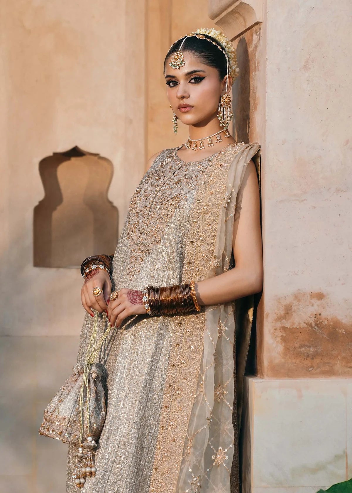 Sitara greyish brown embellished outfit with churidar pajama and organza dupatta by Kanwal Malik from the Saheli Luxury Pret Collection, ideal for festive dinners.