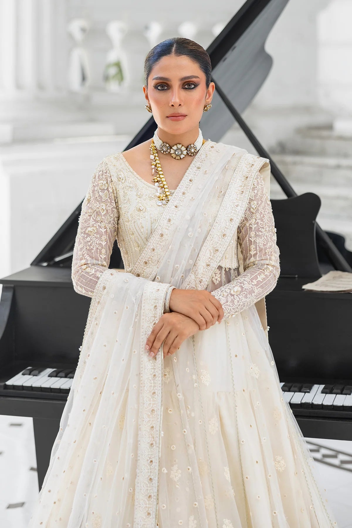 Snow Pearl heavily embroidered Pakistani bridal lehenga pishwas with net dupatta – Erum Khan Jahan Vol IV designer outfit.