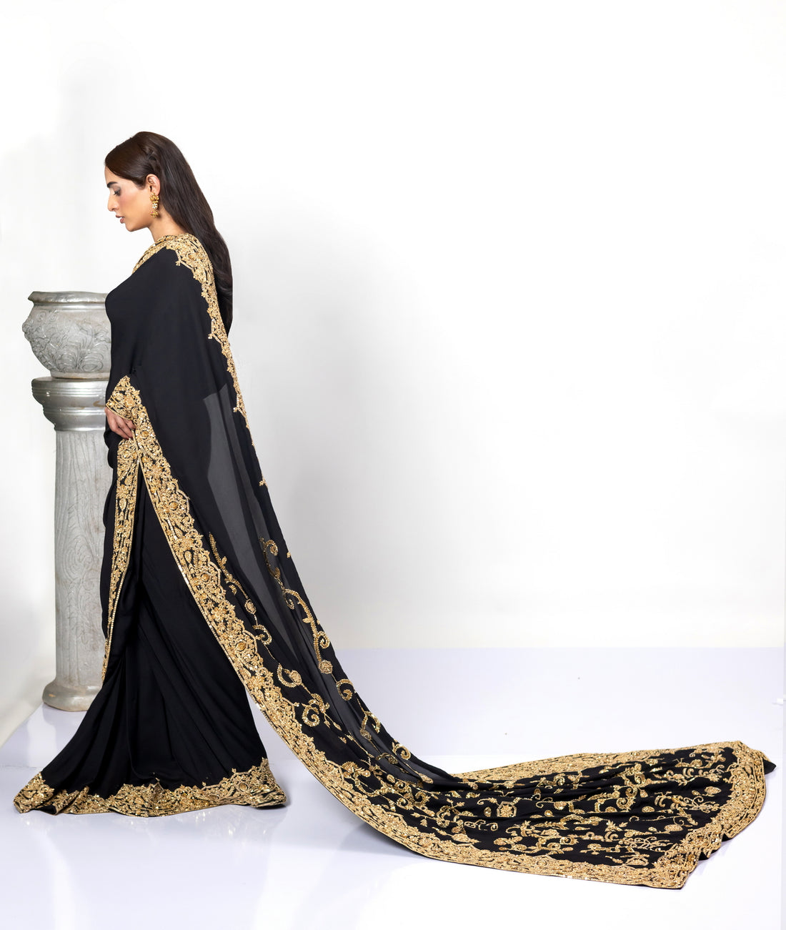 Sofi Black Saree by MariamRaj with gold handwork and Korean silk patti coat for weddings .