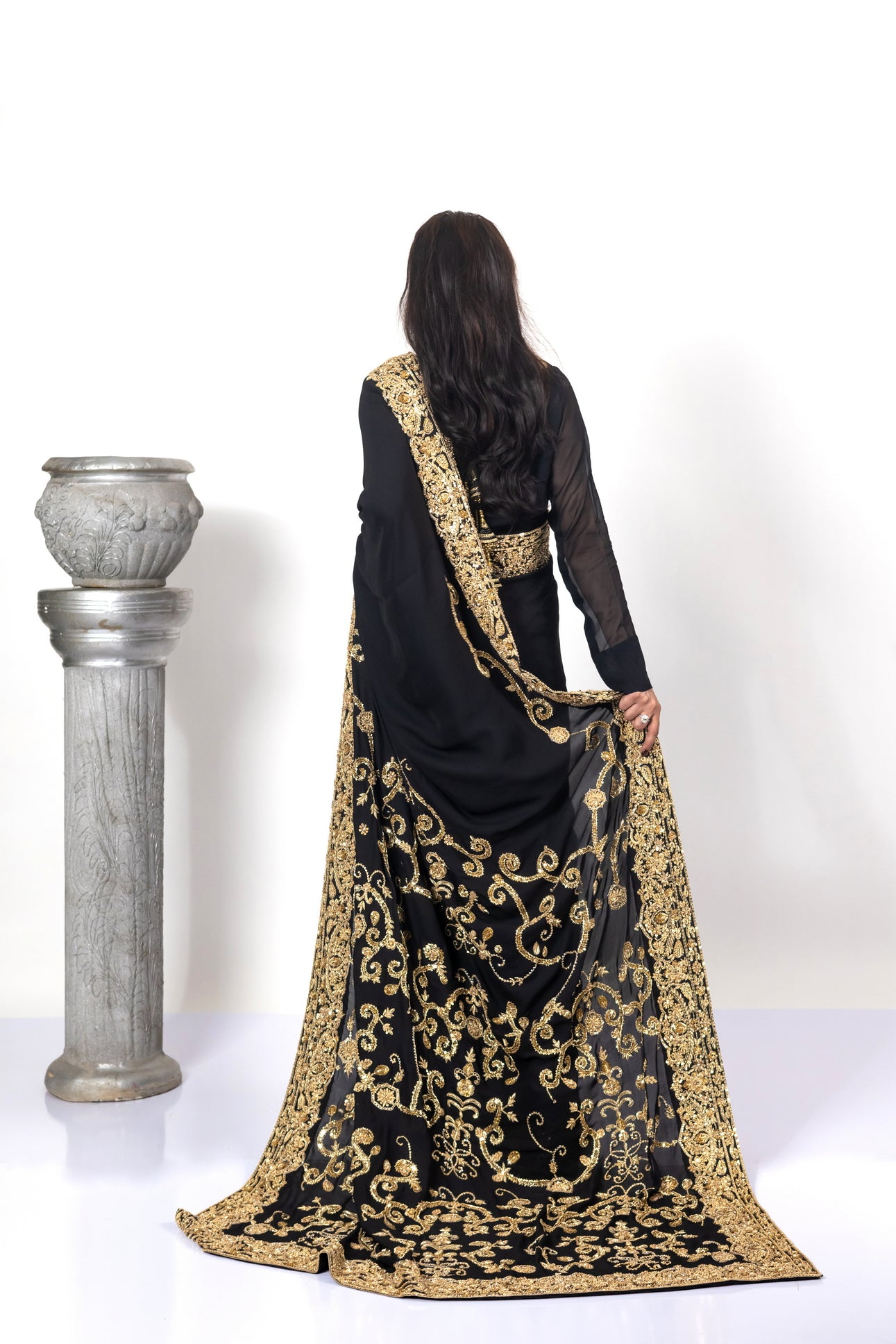 Sofi Black Saree by MariamRaj with gold handwork and Korean silk patti coat for weddings .