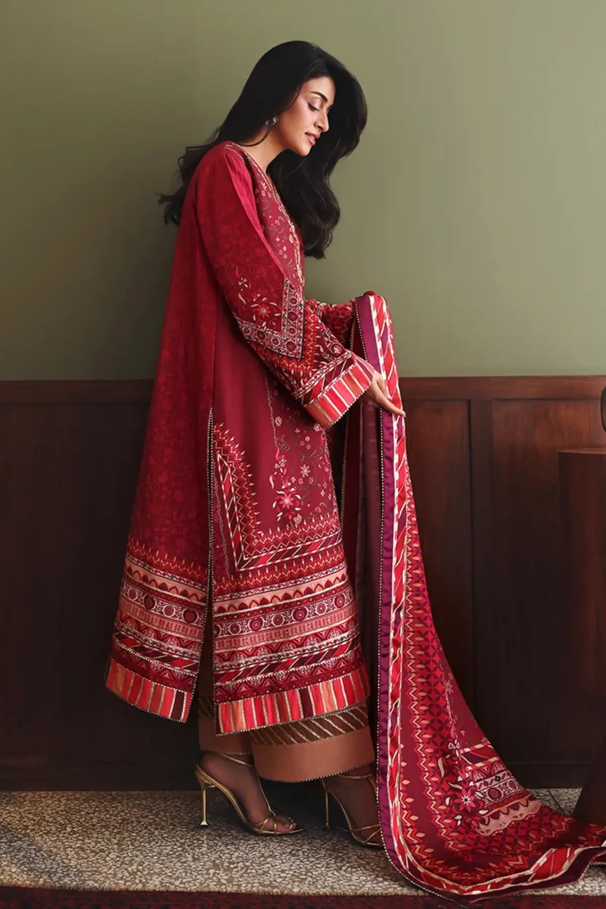 Soft Spotlight Nirvana Anmol Edit red printed embellished raw silk stitched 3PC Pakistani suit with printed silk dupatta