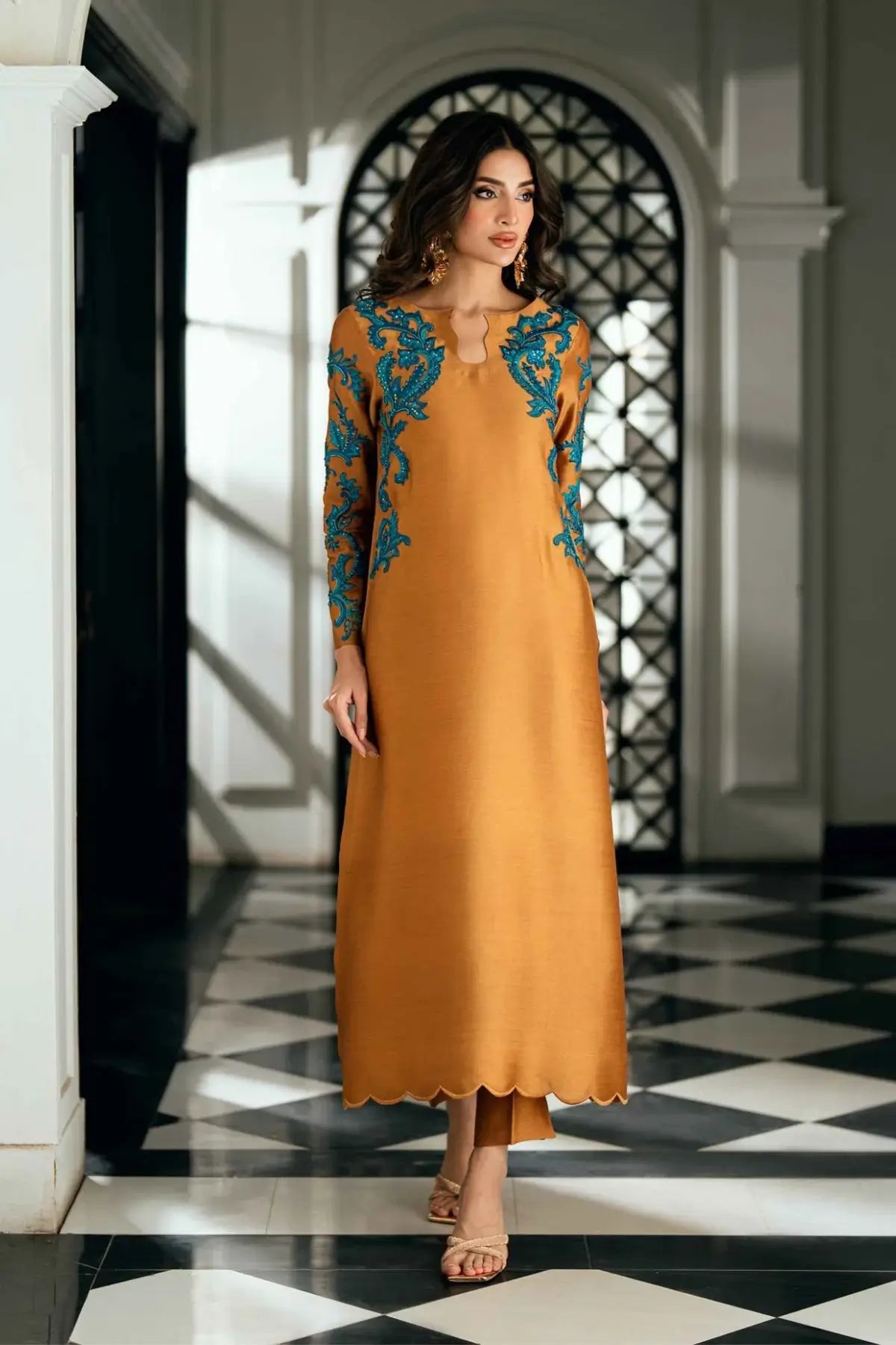 Solara golden stitched viscose silk Pakistani formal dress with ferozi handwork available online at Pakistanimoda.