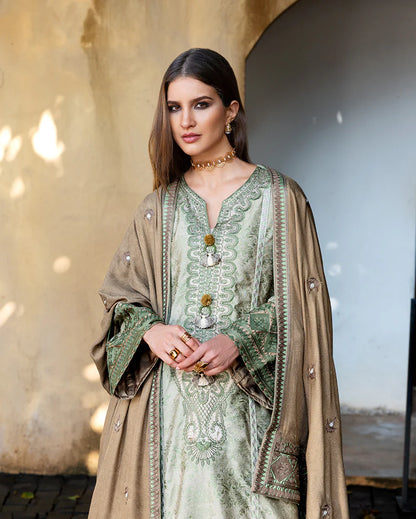 Model wearing Mushq Solare beige brown jacquard embroidered winter dress with dobby shawl – Winter Broadway 2025