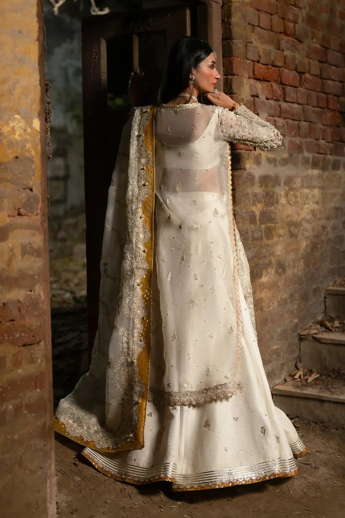 Nyra Collections ivory organza stitched gharara Eid wear.