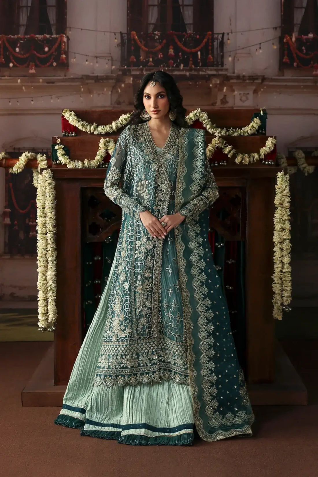Suhan teal green embroidered organza stitched formal suit with intricate silver detailing, jamawar sharara and organza dupatta