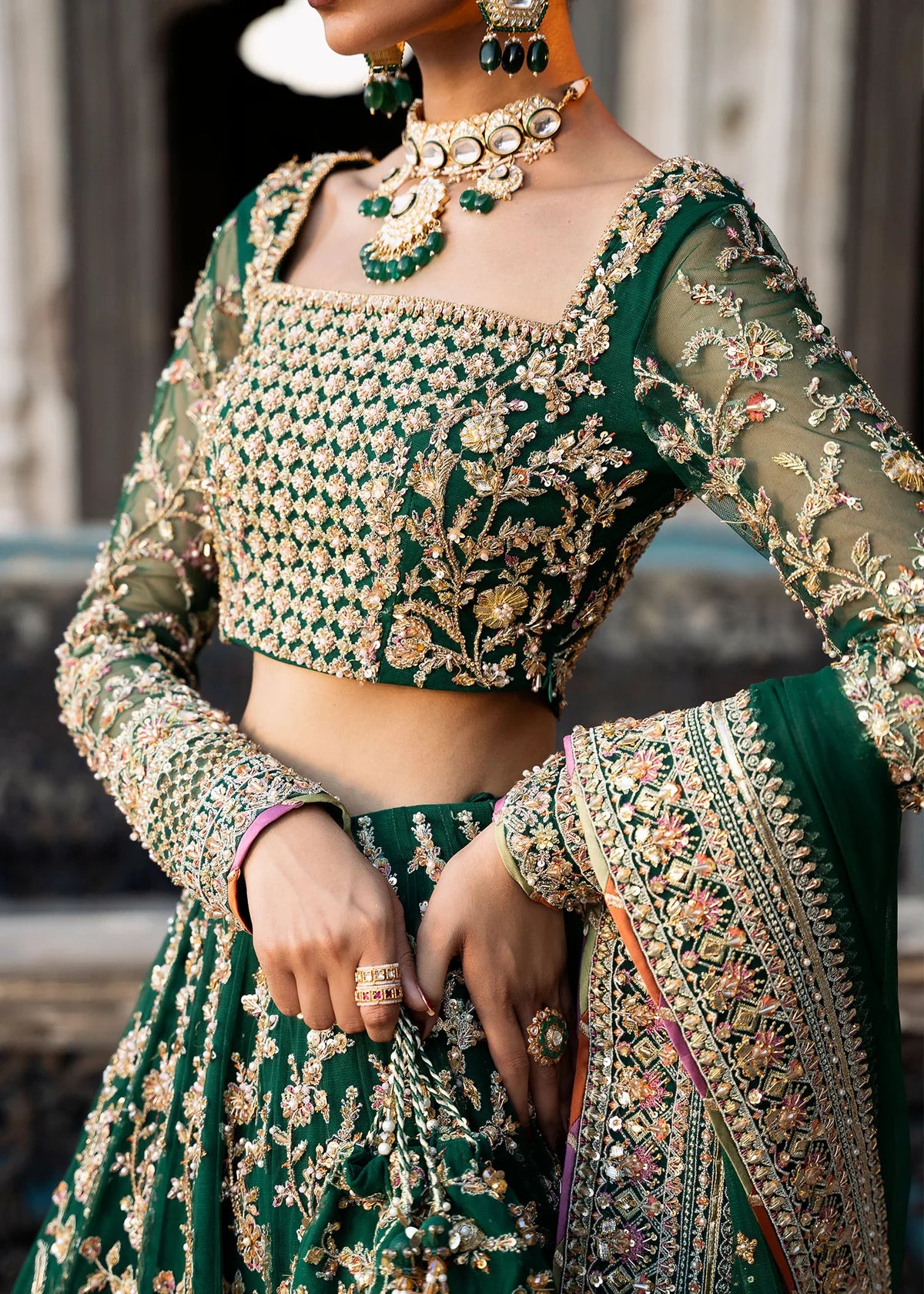 Sukhan stitched bottle green lehenga choli set by Kanwal Malik, featuring floral jaal embroidery, intricate hand embellishments, and net dupatta for weddings.