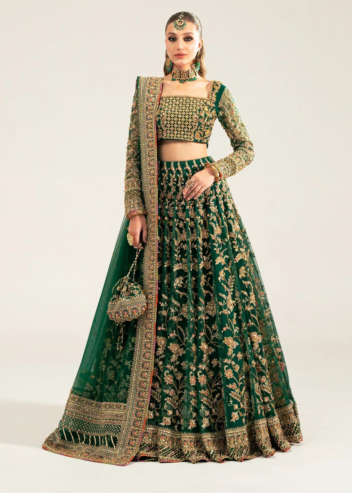 Sukhan stitched bottle green lehenga choli set by Kanwal Malik, featuring floral jaal embroidery, intricate hand embellishments, and net dupatta for weddings.