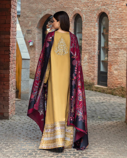Model wearing Mushq Sunlit Siena gold yellow embroidered herringbone winter suit with matching shawl – Winter Broadway 2025