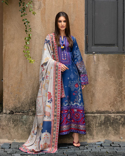 Model wearing Mushq Sunset Promise blue jacquard embroidered winter suit with matching shawl – Winter Broadway 2025