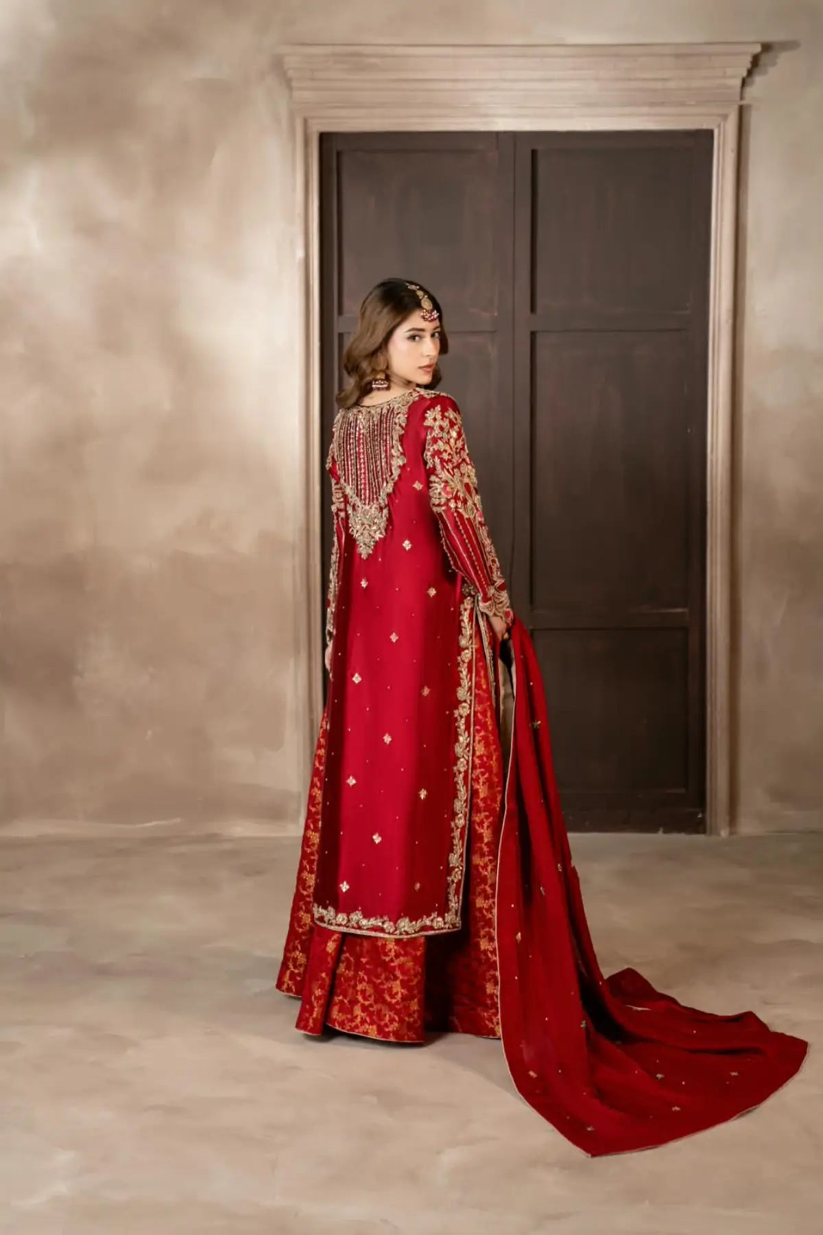 Surkhroo deep red hand embellished Sheesha silk formal suit with Jamawar palazzo and organza dupatta by MariamRaj