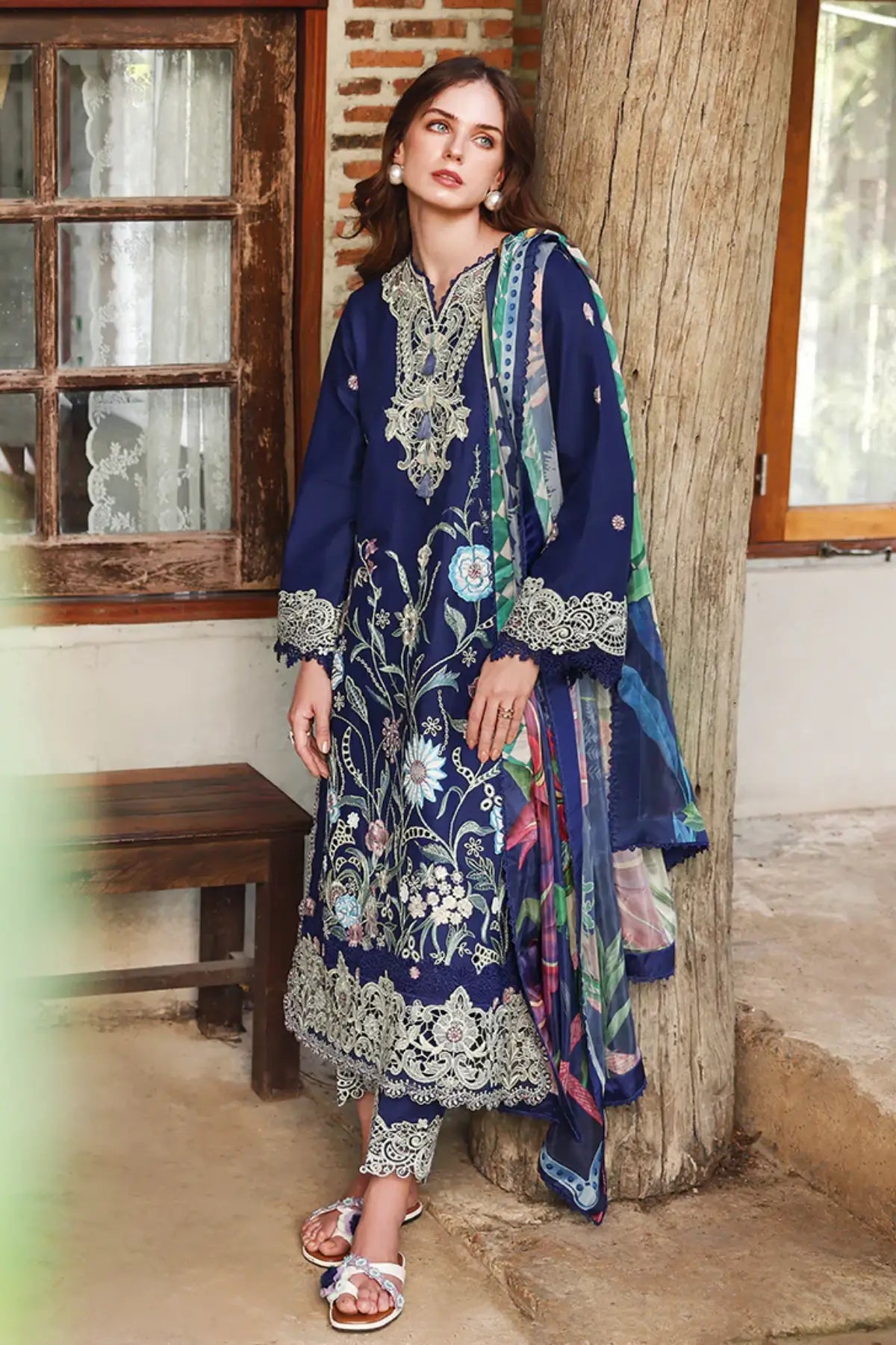 Mushq Sylphae blue embroidered lawn stitched suit with embellished tassels, silk dupatta and appliqué work with luxury finish