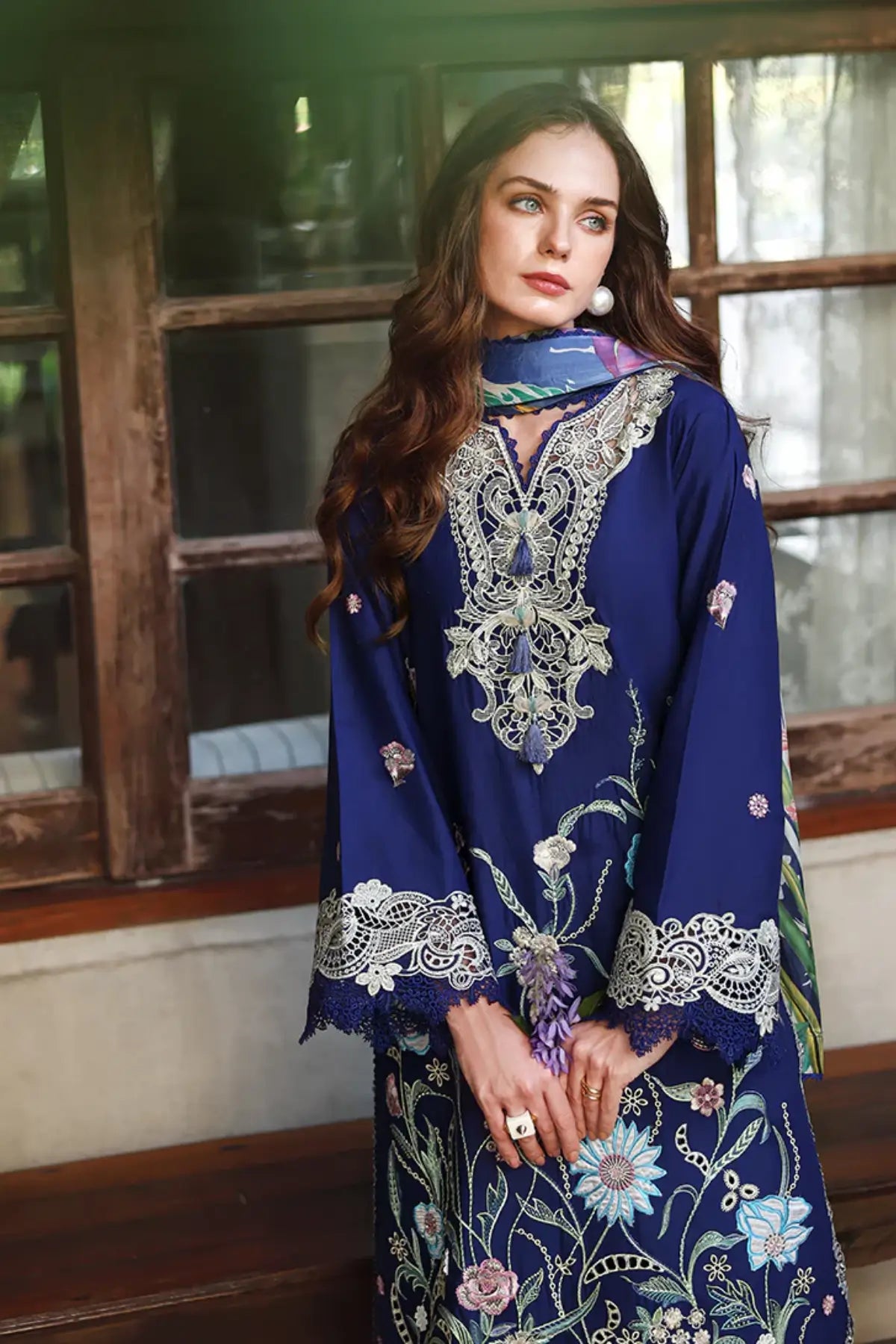 Mushq Sylphae blue embroidered lawn stitched suit with embellished tassels, silk dupatta and appliqué work with luxury finish