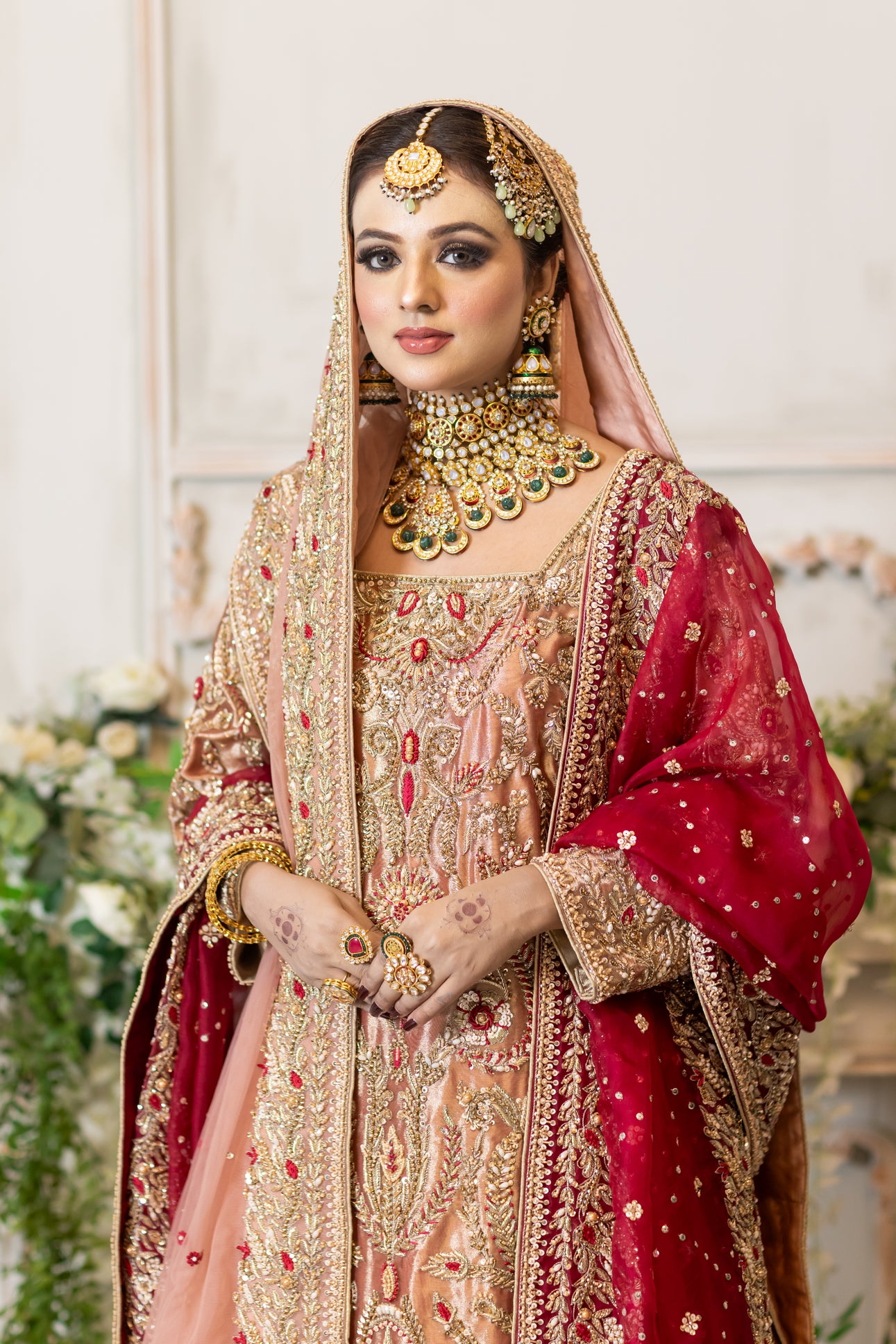 Tabinda peach tissue bridal lehenga with dual dupattas and red jamawar trail – Barrat Day bridal outfit.