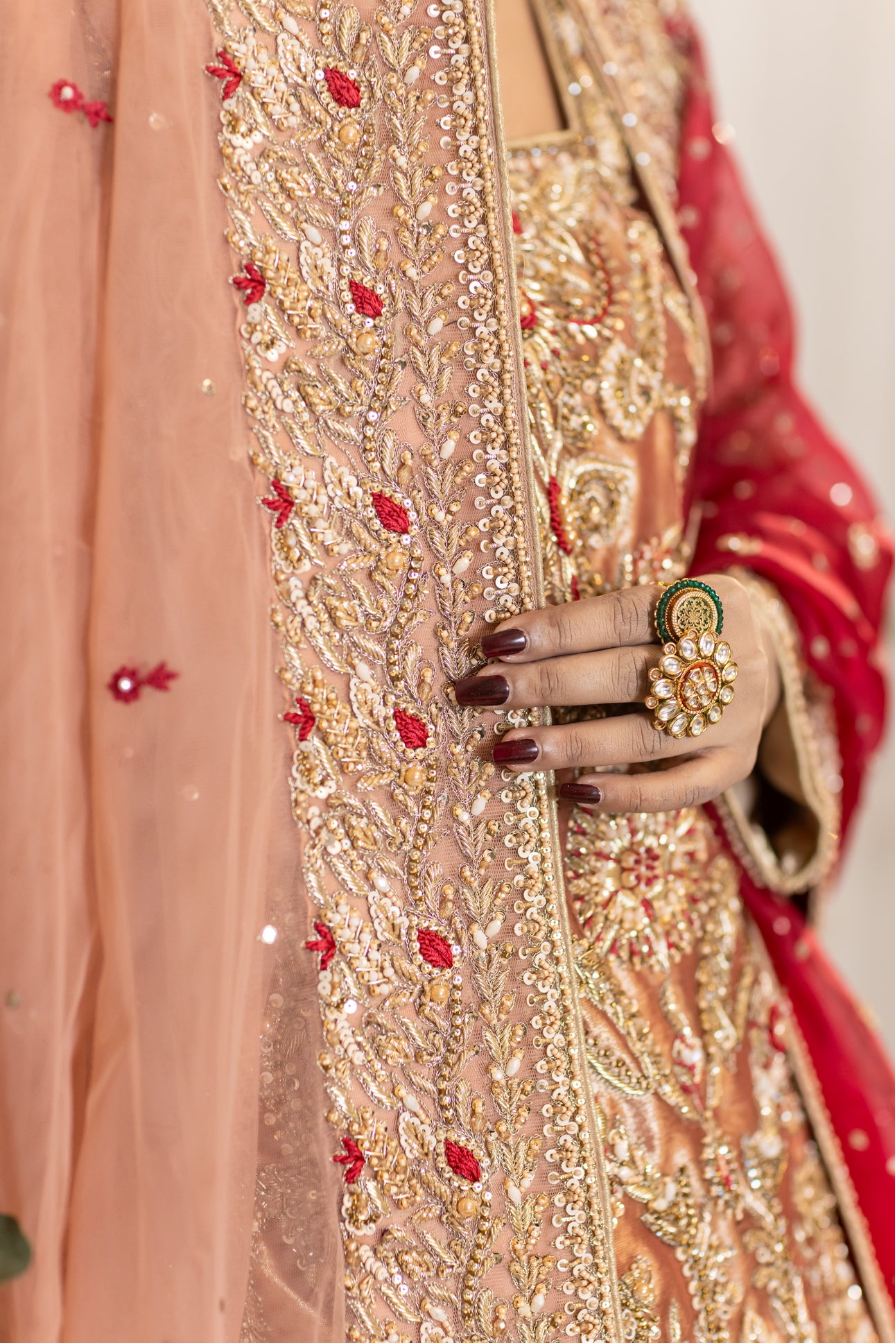 Tabinda peach tissue bridal lehenga with dual dupattas and red jamawar trail – Barrat Day bridal outfit.