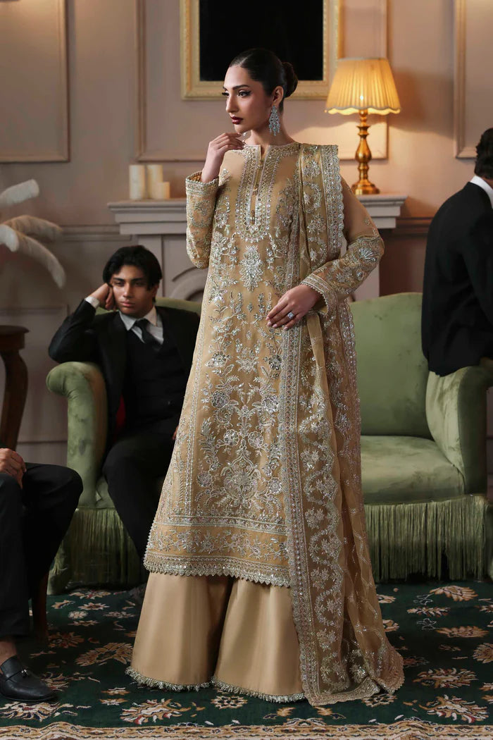 Tajmeen designer golden organza embroidered long shirt with raw silk trousers and dupatta by Akbar Aslam, luxury formal outfit for weddings and festive events.