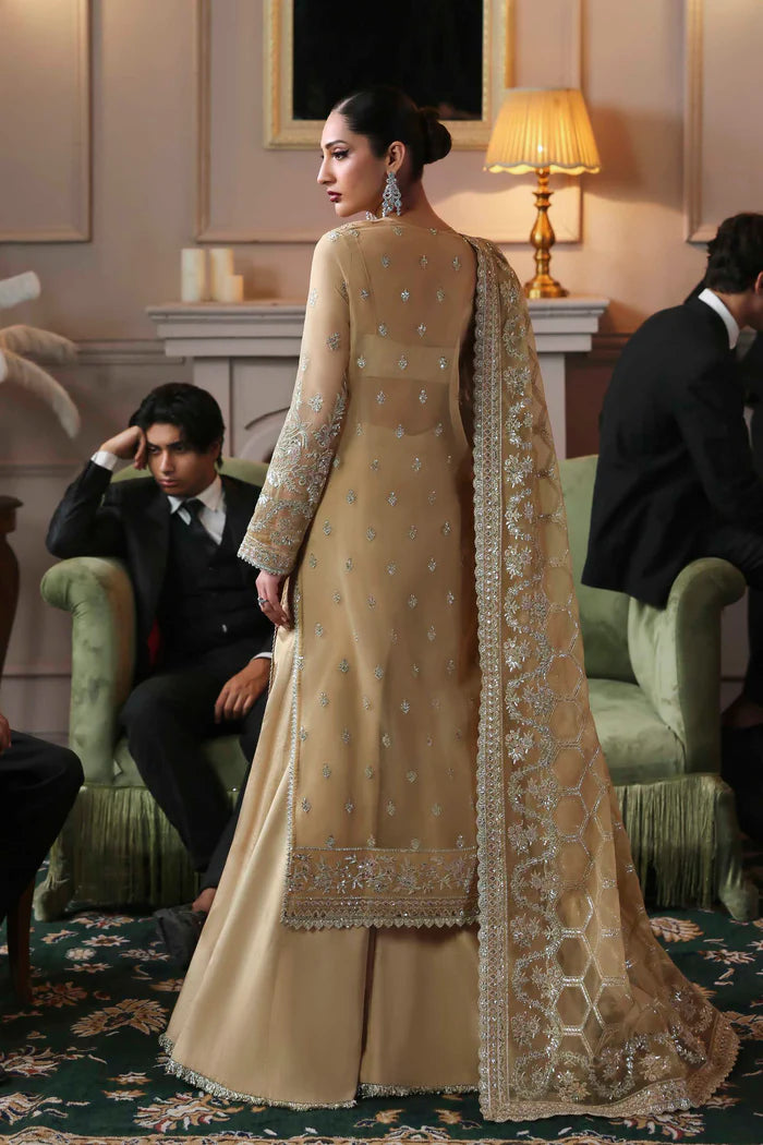 Tajmeen designer golden organza embroidered long shirt with raw silk trousers and dupatta by Akbar Aslam, luxury formal outfit for weddings and festive events.