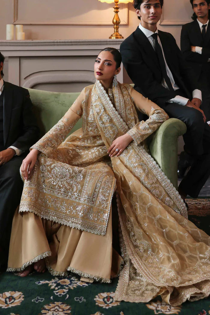 Tajmeen designer golden organza embroidered long shirt with raw silk trousers and dupatta by Akbar Aslam, luxury formal outfit for weddings and festive events.